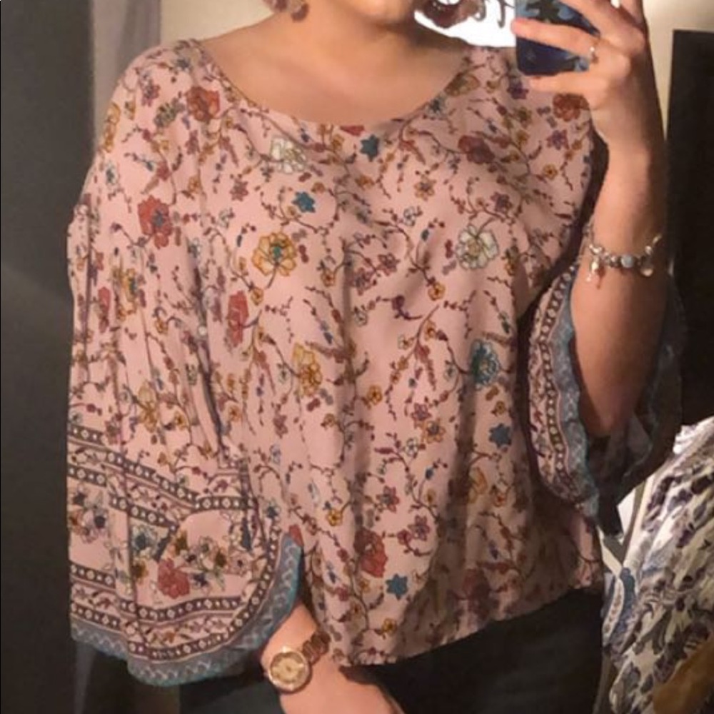 Open back Charming Charlie’s top